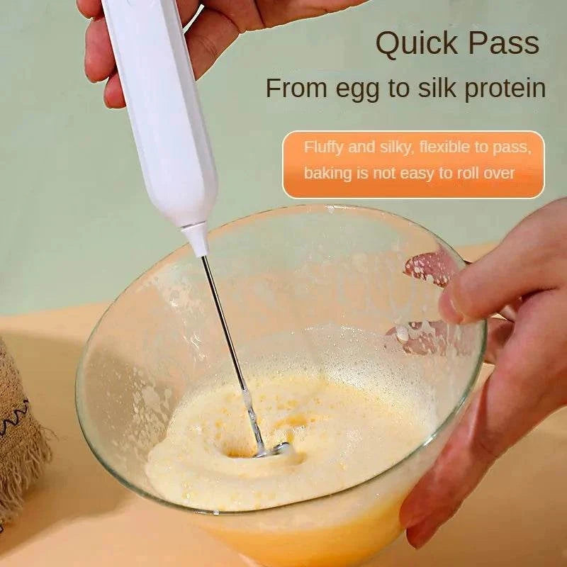 Handheld milk frother